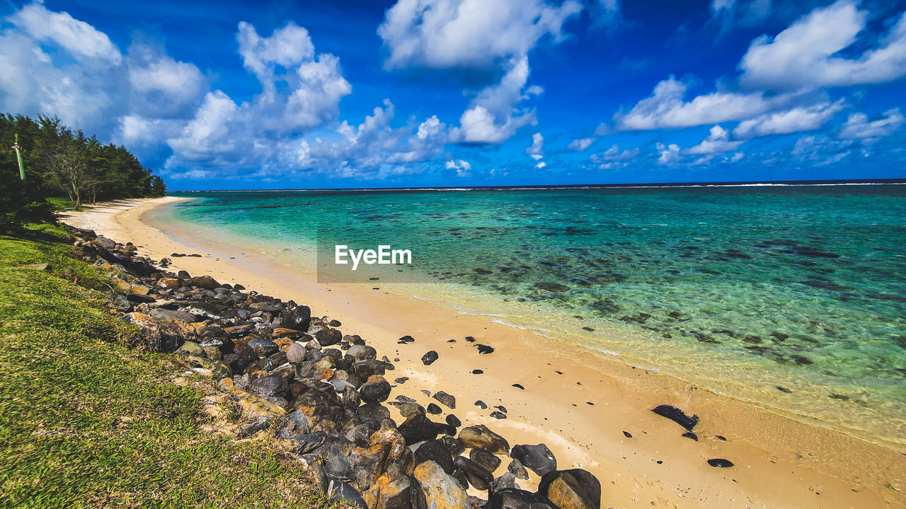 panoramic view of beach against sky