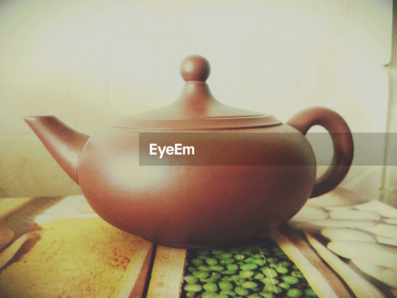 Close-up of teapot on table