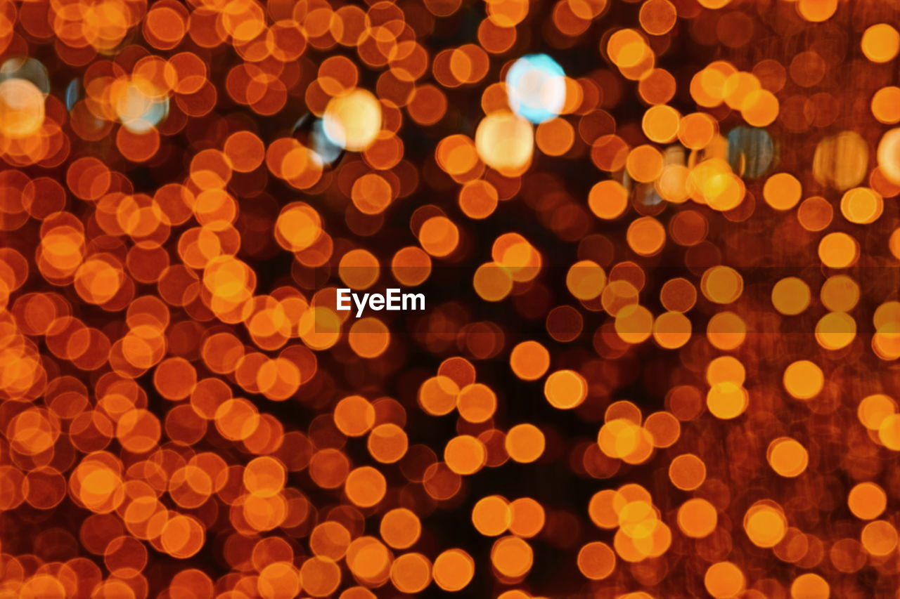 Gold color abstract of blur and bokeh colorful light interior and night garden background