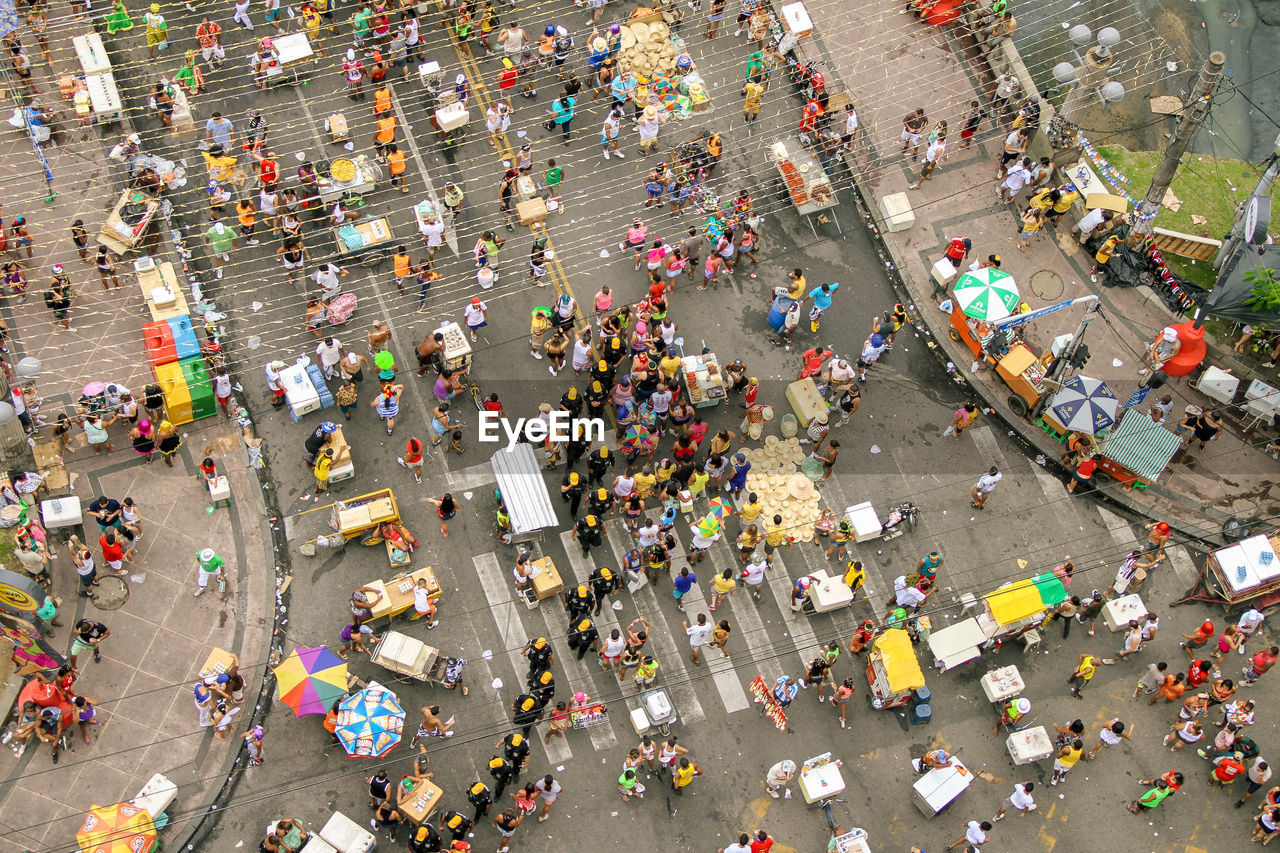 High angle view of people walking on street