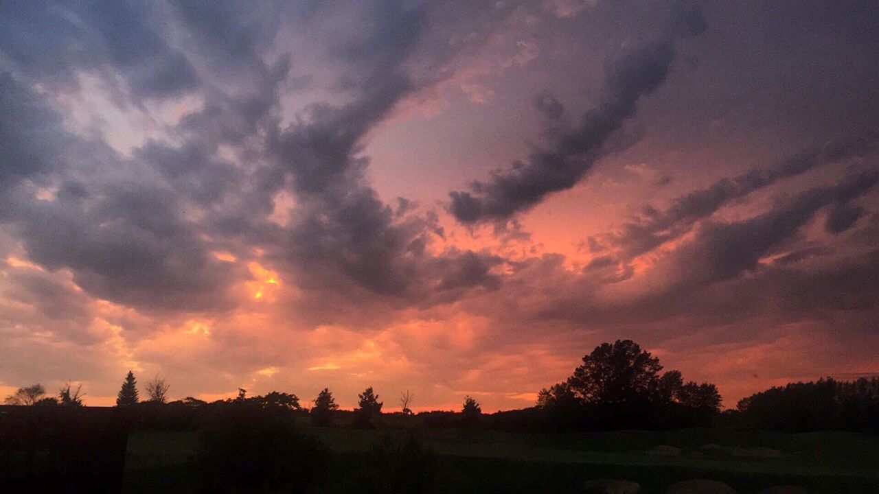 SUNSET OVER LANDSCAPE