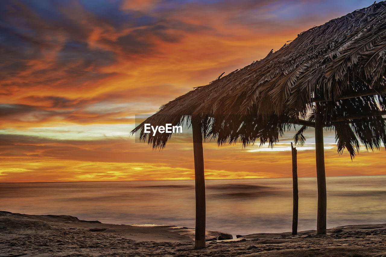 Scenic view of beach during sunset