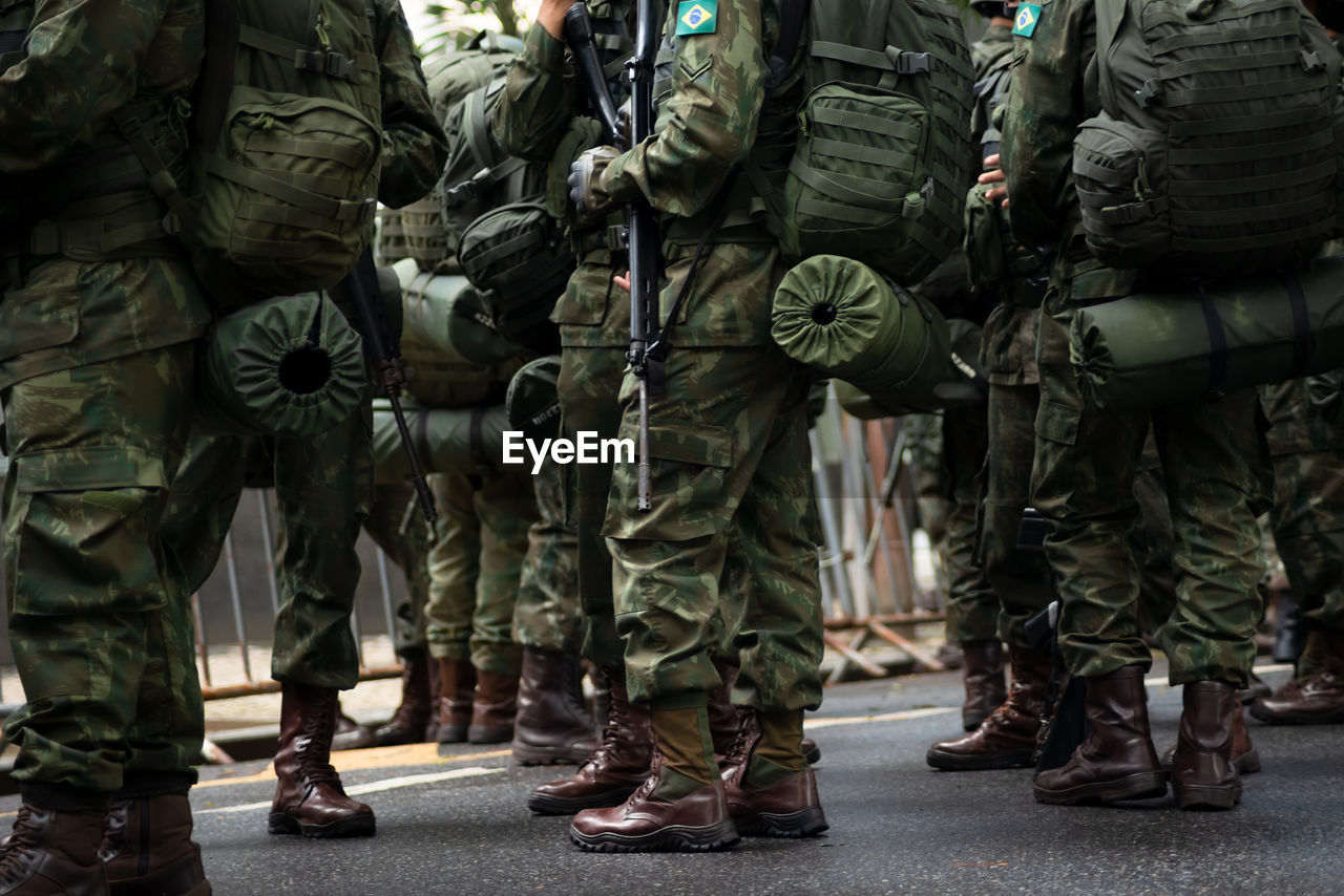 Army soldiers await the start of the brazilian independence parade in the city of salvador, bahia.