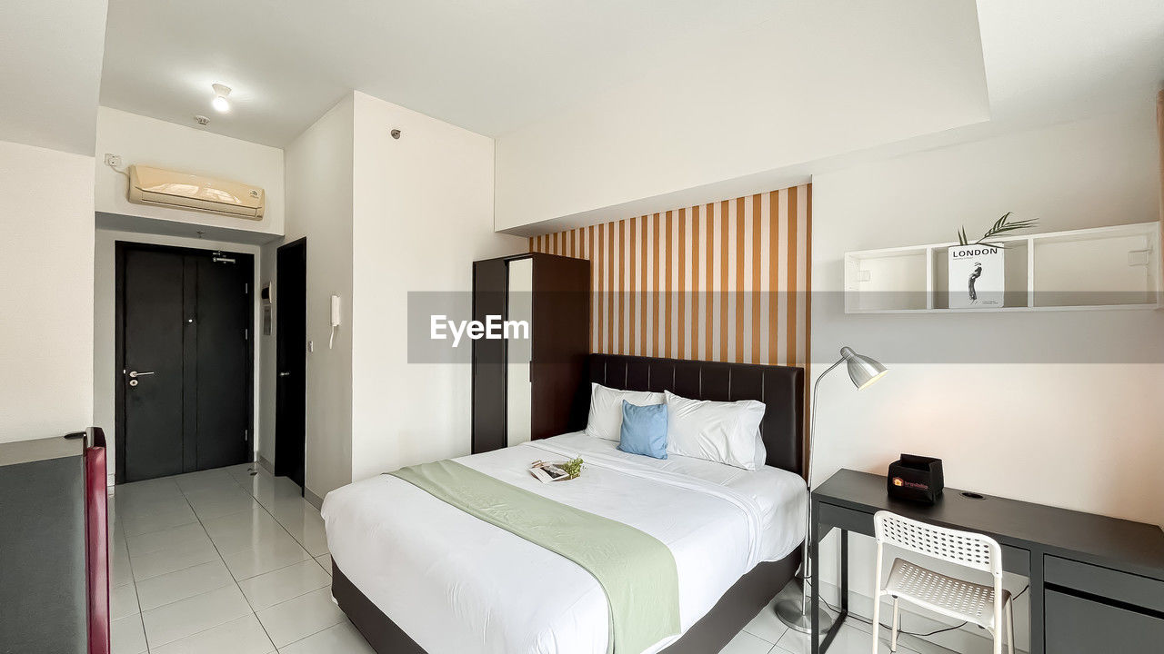 furniture, domestic room, home interior, bed, luxury, home, indoors, wealth, room, bedroom, home showcase interior, real estate, architecture, suite, lifestyles, apartment, house, building, no people, domestic life, nightstand, built structure, elegance, lighting equipment, interior design, estate, hotel, residential district, comfortable, cottage, technology
