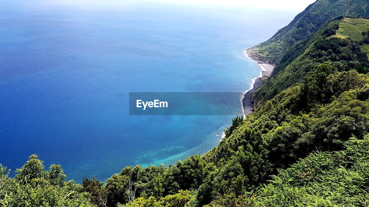 High angle view of sea and mountains