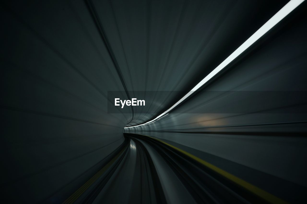 Blurred motion of illuminated tunnel