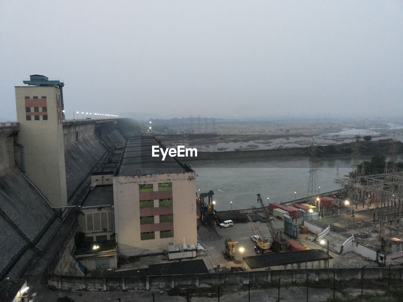 High angle view of dam against clear sky at dusk