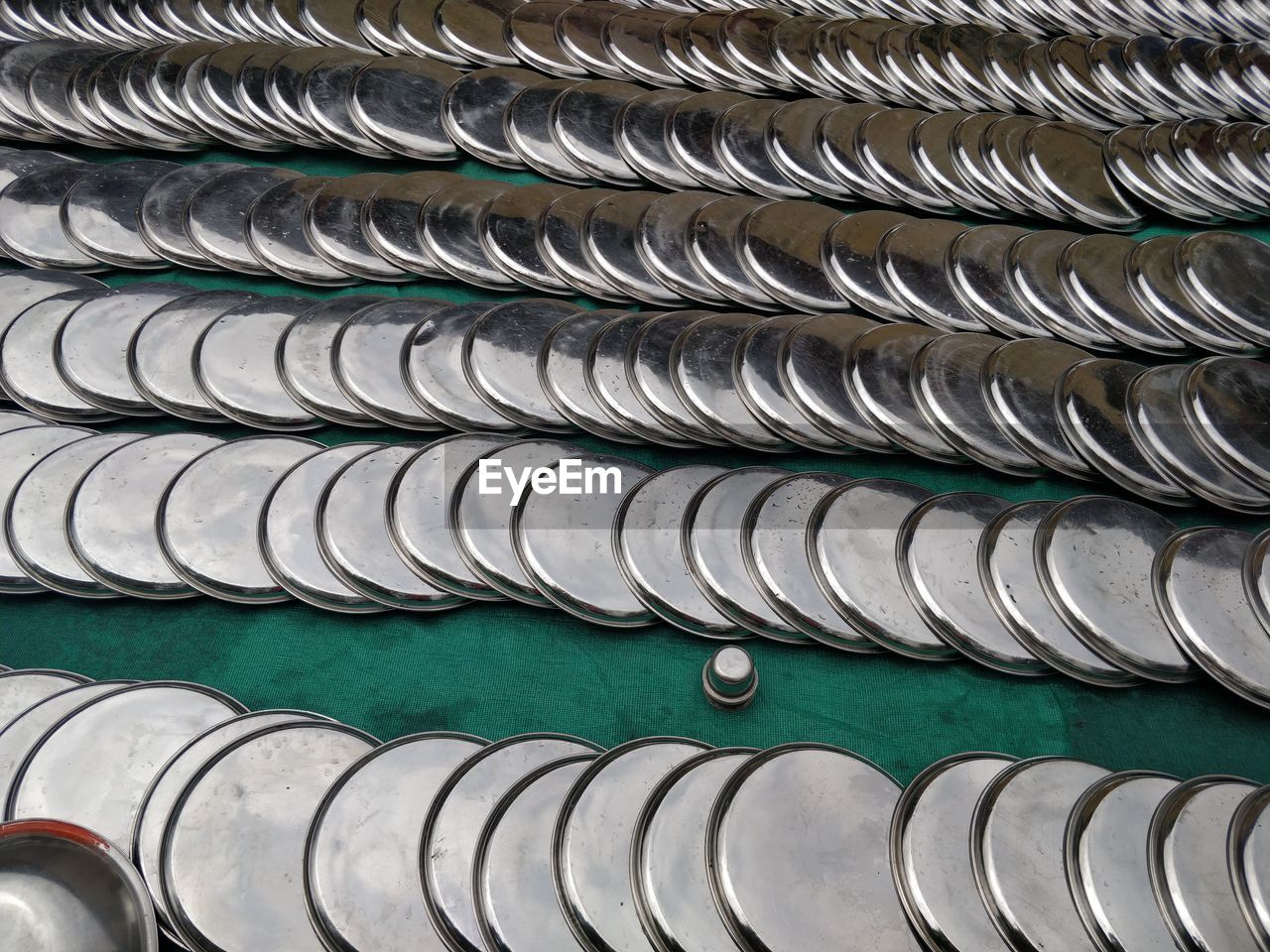 Full frame shot of plates arranged on table