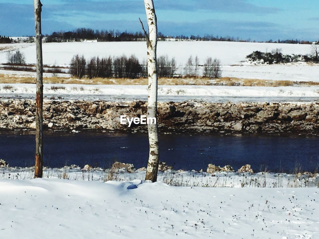 Scenic view of frozen lake during winter