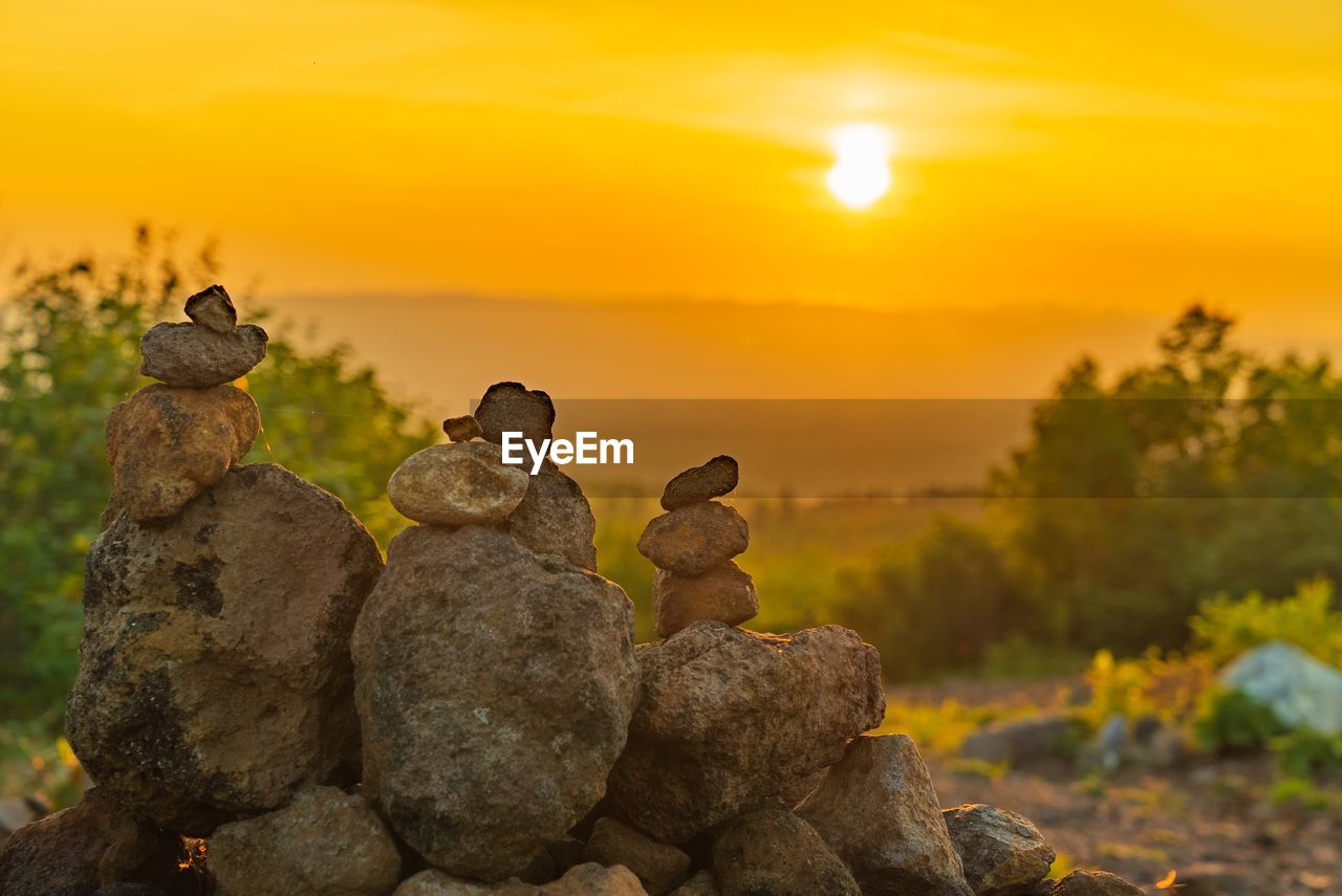 STACK OF ROCKS AT SUNSET