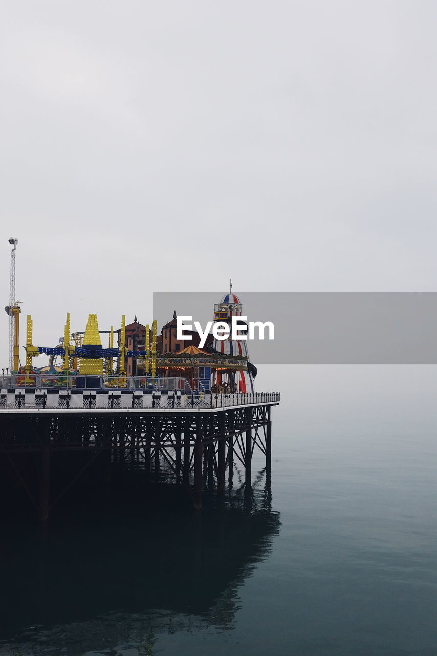 Palace pier over sea against clear sky