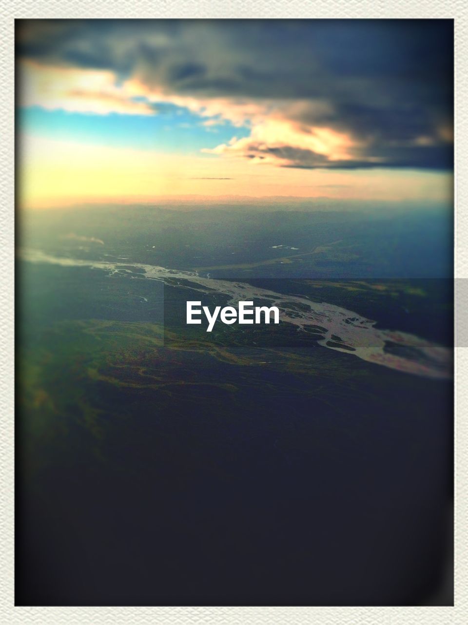 AERIAL VIEW OF LANDSCAPE AT SUNSET