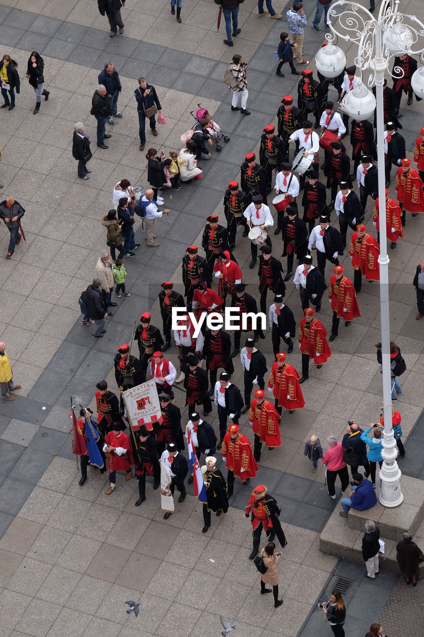 High angle view of people walking on street