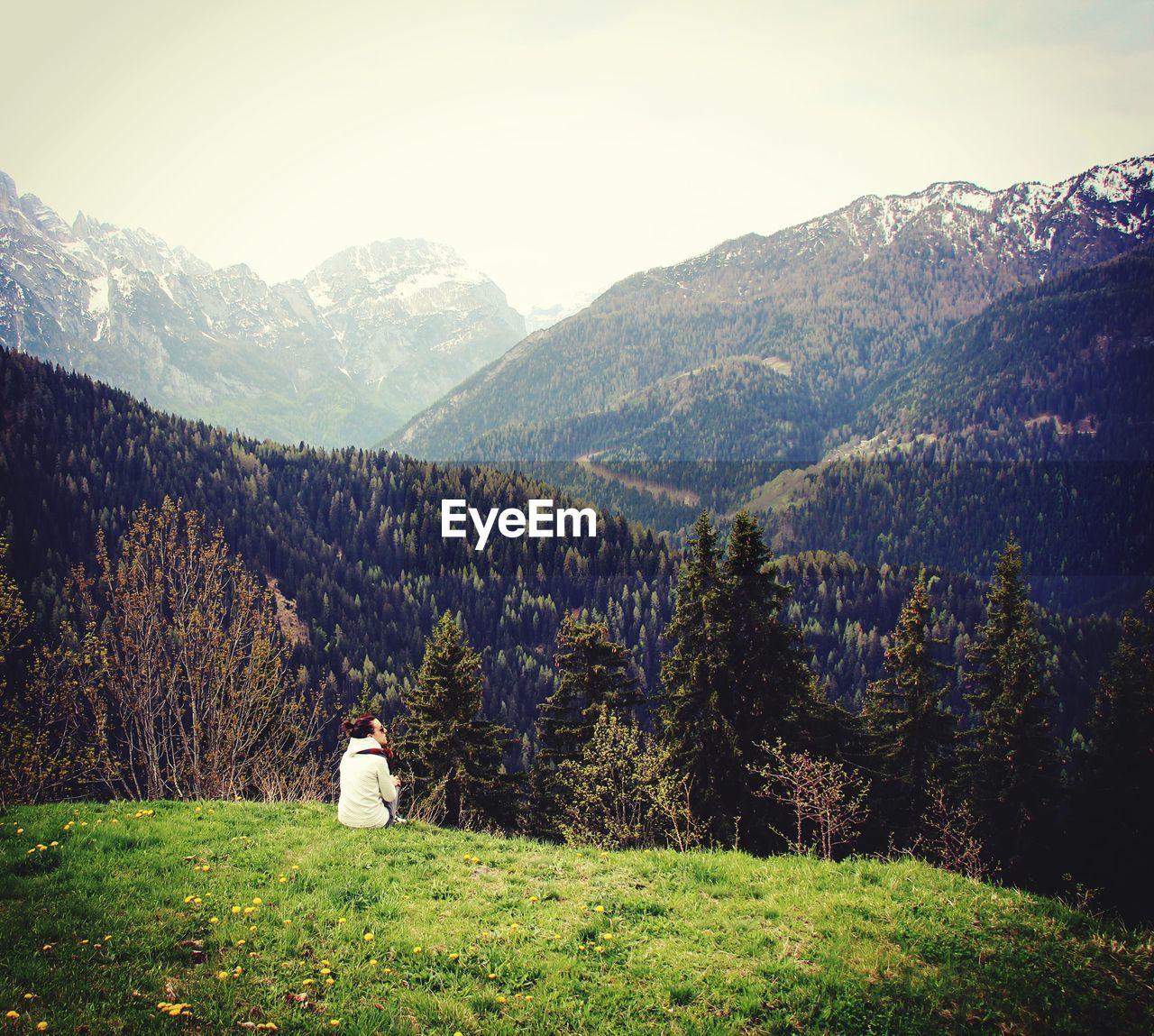 Rear view of woman looking at mountains