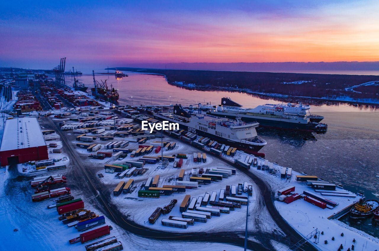 HIGH ANGLE VIEW OF HARBOR DURING WINTER