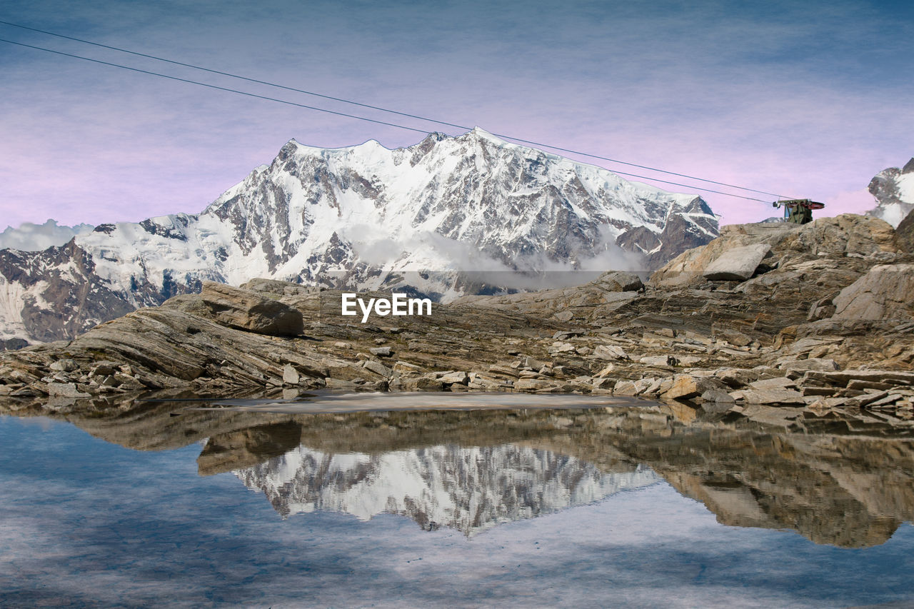 View of the peak of monte rosa massif in the summer season against the blue sky in valle anscasca