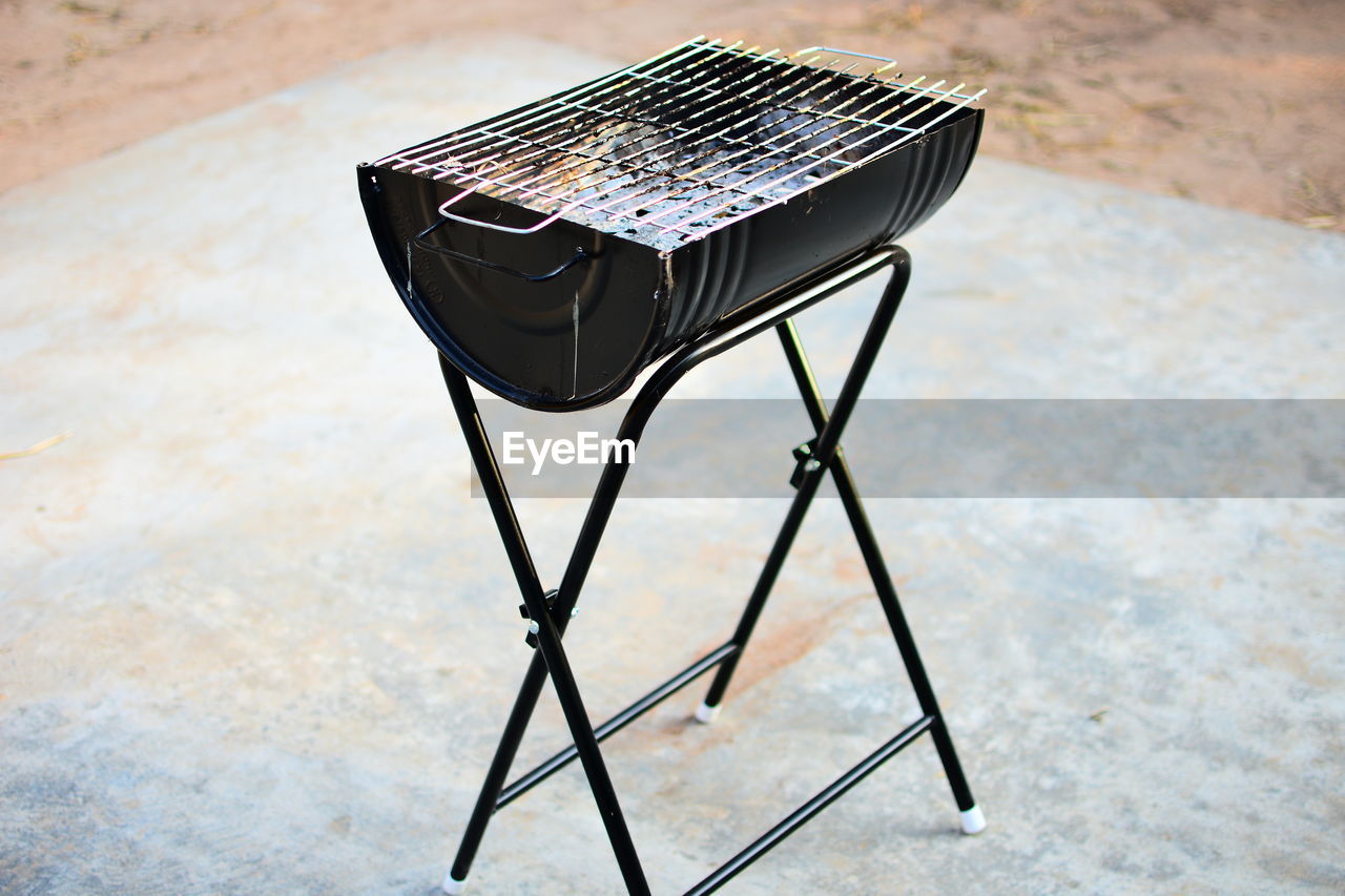 furniture, table, seat, chair, no people, black, iron, high angle view, electronic instrument