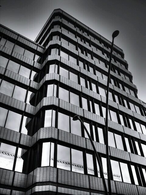 LOW ANGLE VIEW OF MODERN BUILDINGS