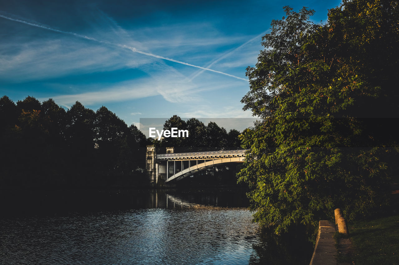 Bridge over river against sky