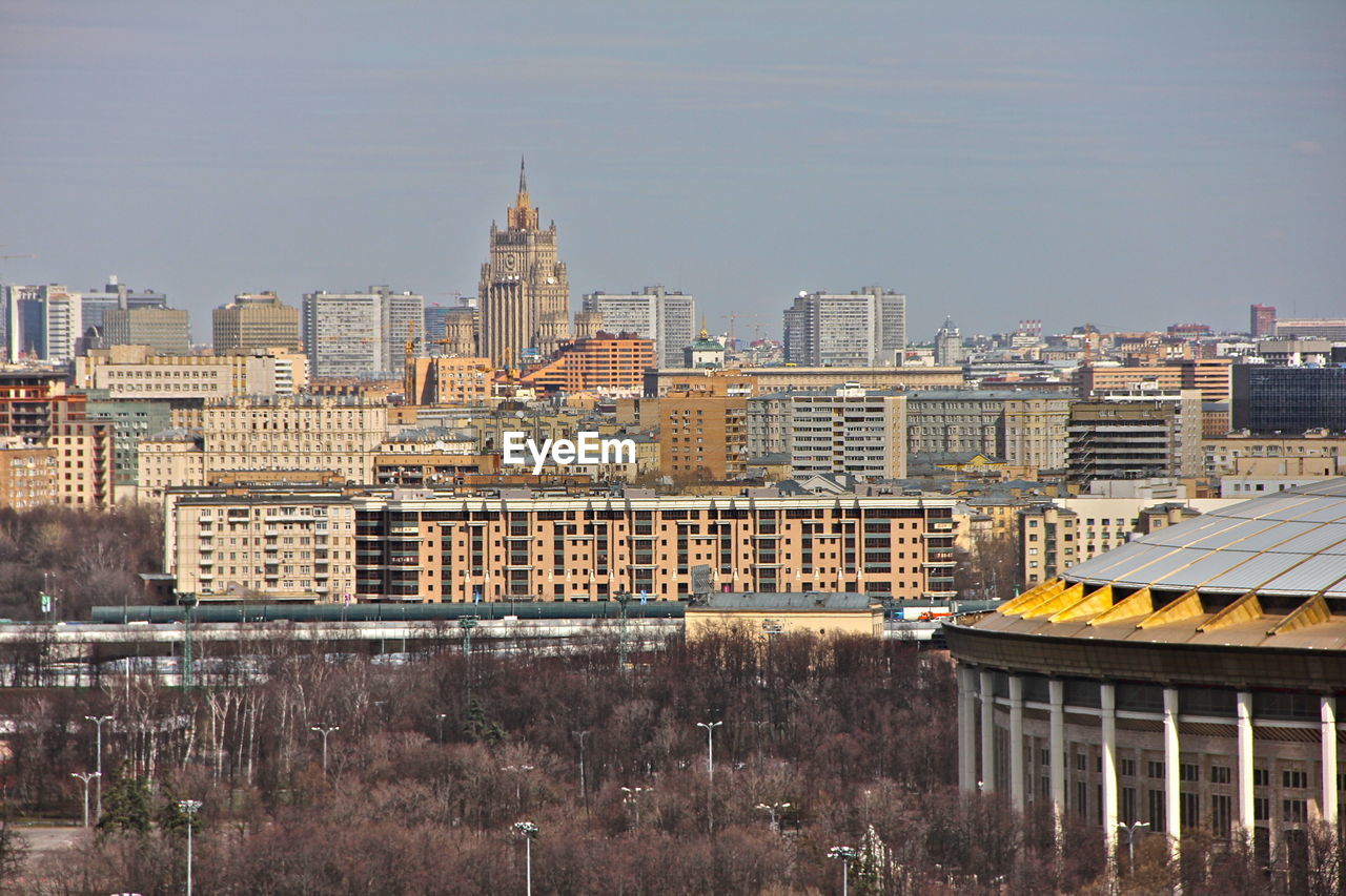 VIEW OF BUILDINGS IN CITY AGAINST CLEAR SKY