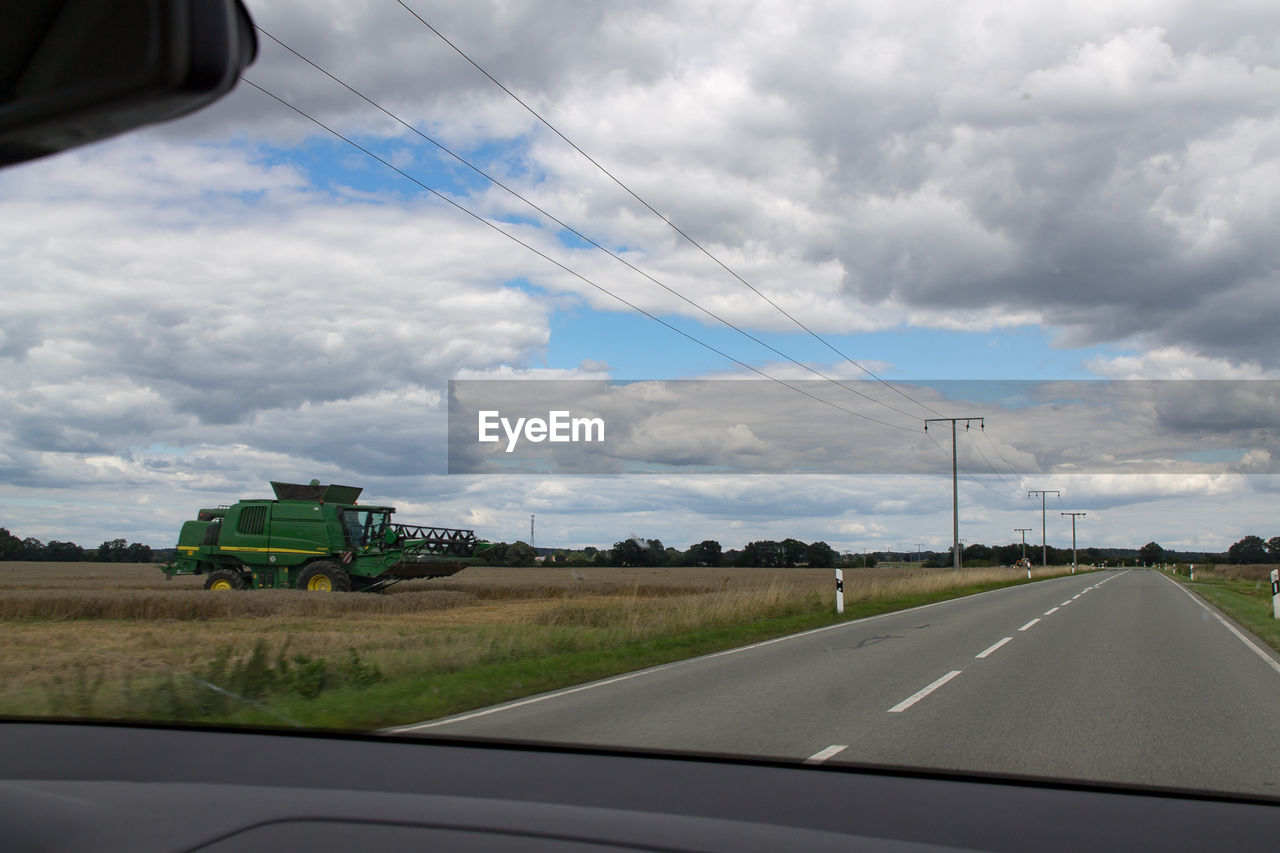 Country road passing through rural landscape