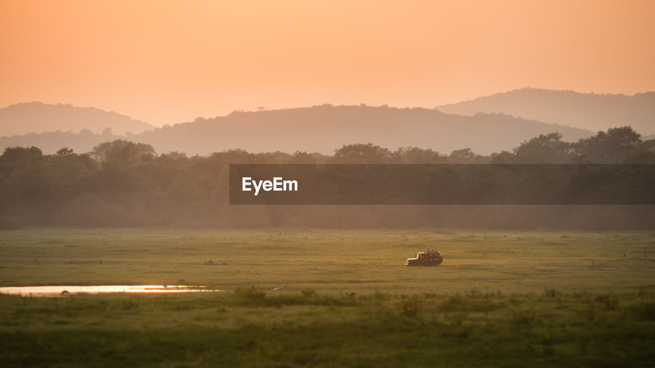 Scenic view of landscape during sunset