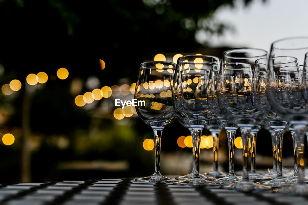 CLOSE-UP OF WINEGLASS ON TABLE