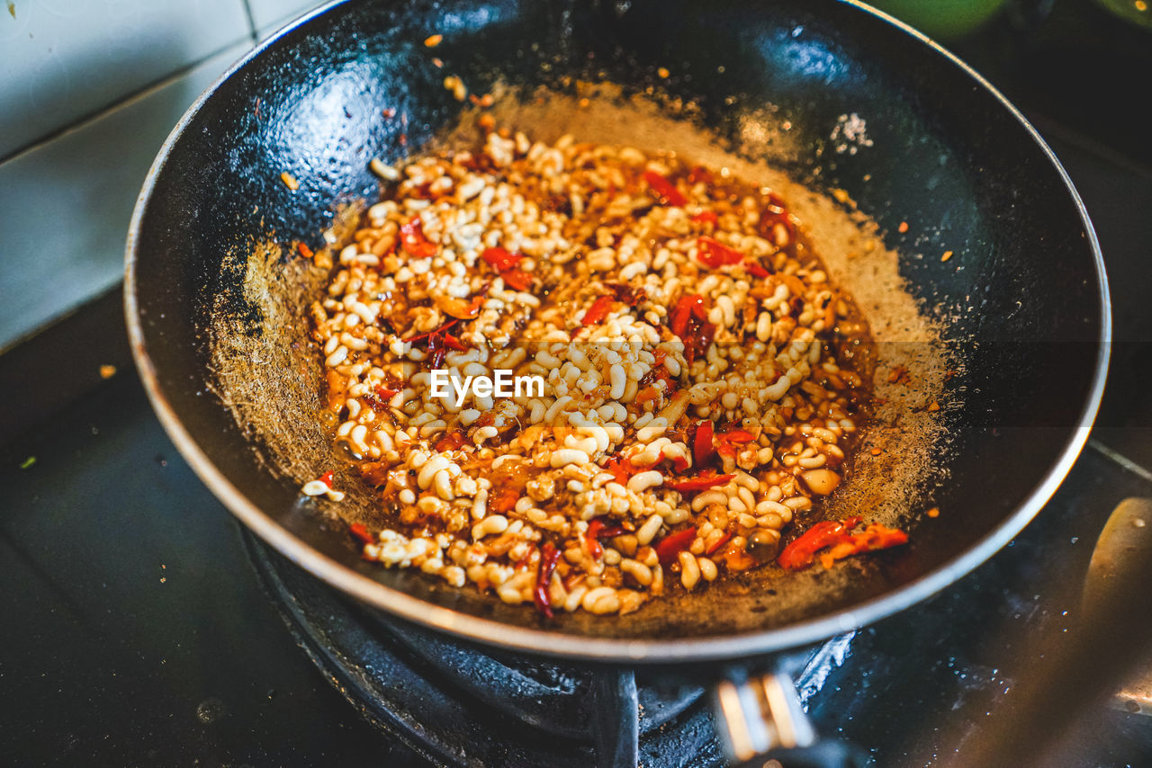 High angle view of meat in cooking pan