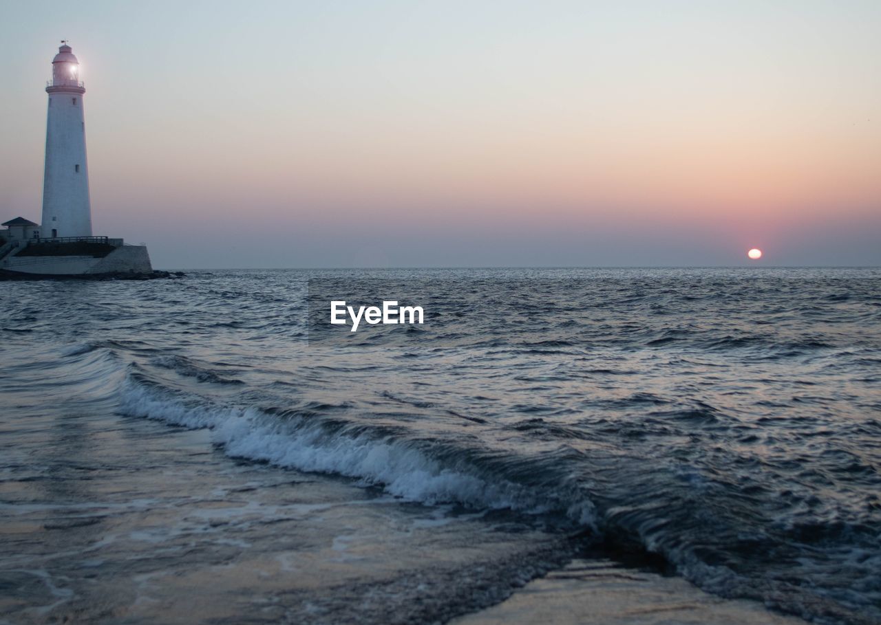 SCENIC VIEW OF SEA DURING SUNSET