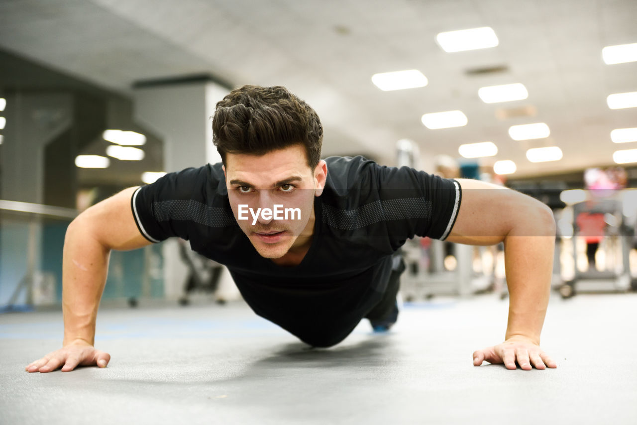 Man exercising in gym