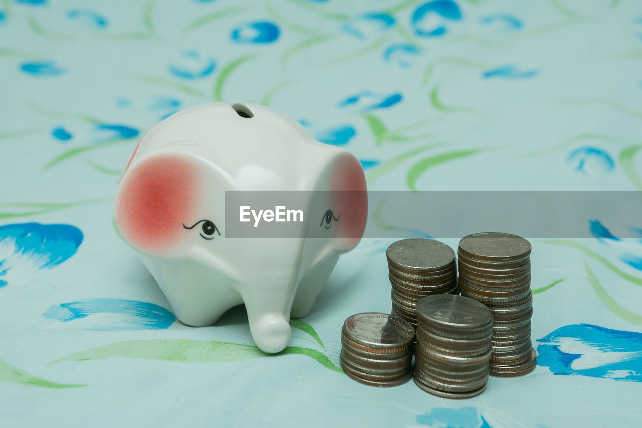 High angle view of coins on table