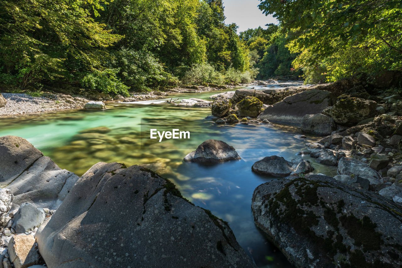 Boulders and rocks on the riverbed of the torre river. friuli to discover