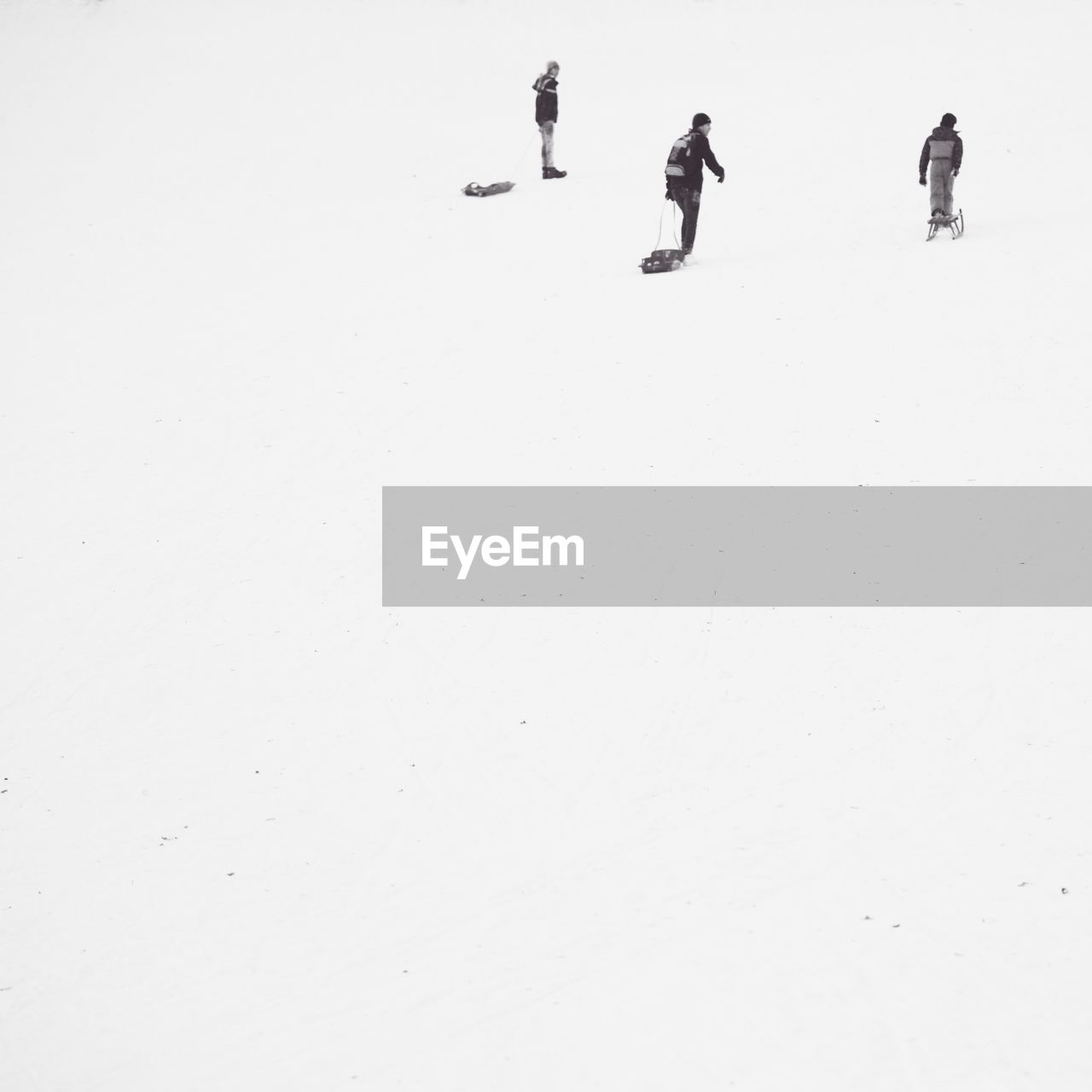 PEOPLE WALKING ON SNOW