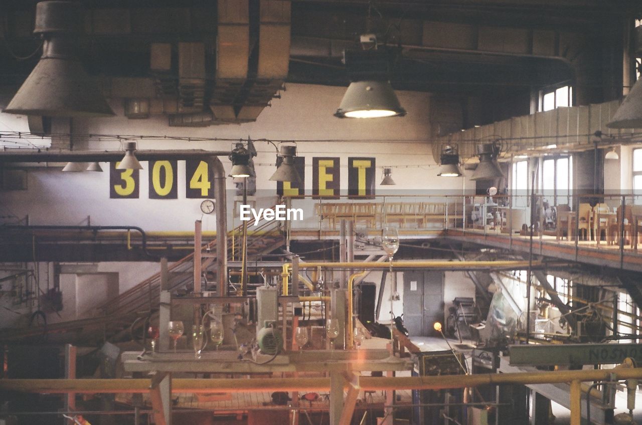 machinery, indoors, industry, factory, no people, illuminated, manufacturing equipment, technology, architecture, day