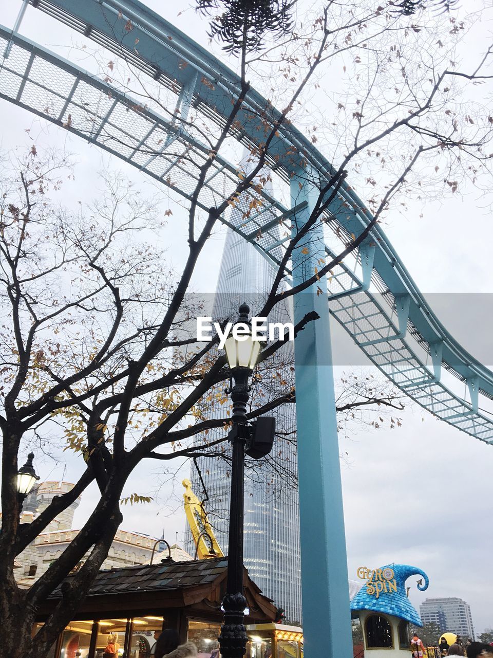 LOW ANGLE VIEW OF FERRIS WHEEL AGAINST SKY