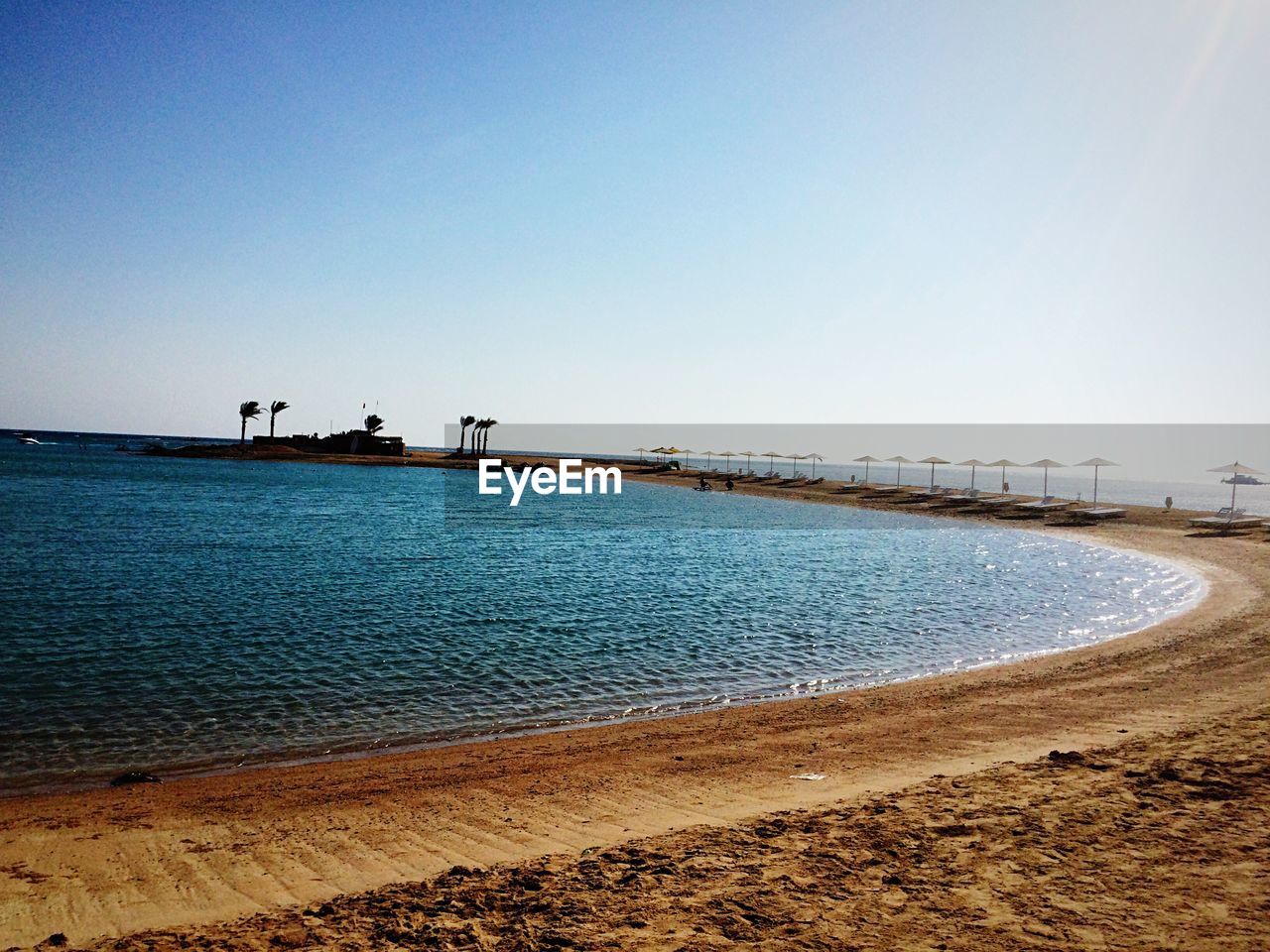 VIEW OF CALM SEA AGAINST CLEAR SKY