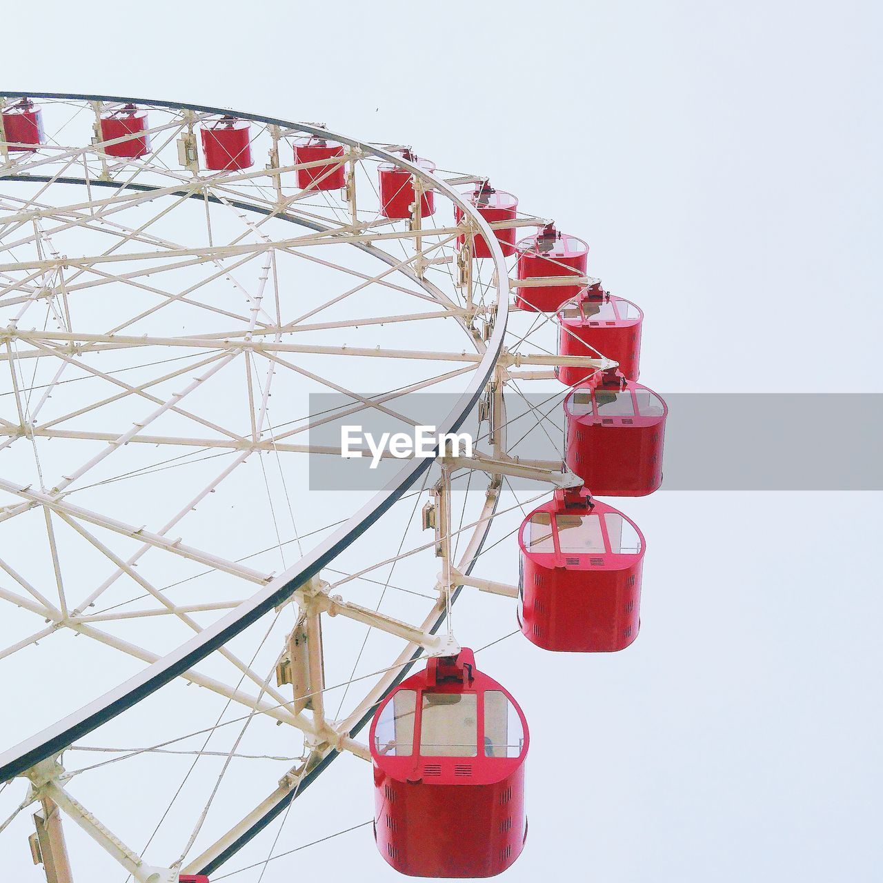 CLOSE-UP OF FERRIS WHEEL AGAINST CLEAR SKY