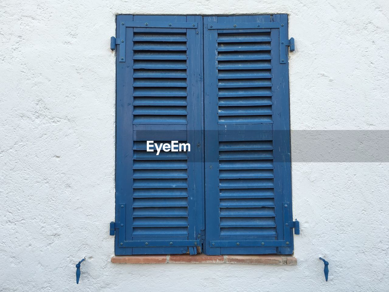 CLOSE-UP OF CLOSED SHUTTER