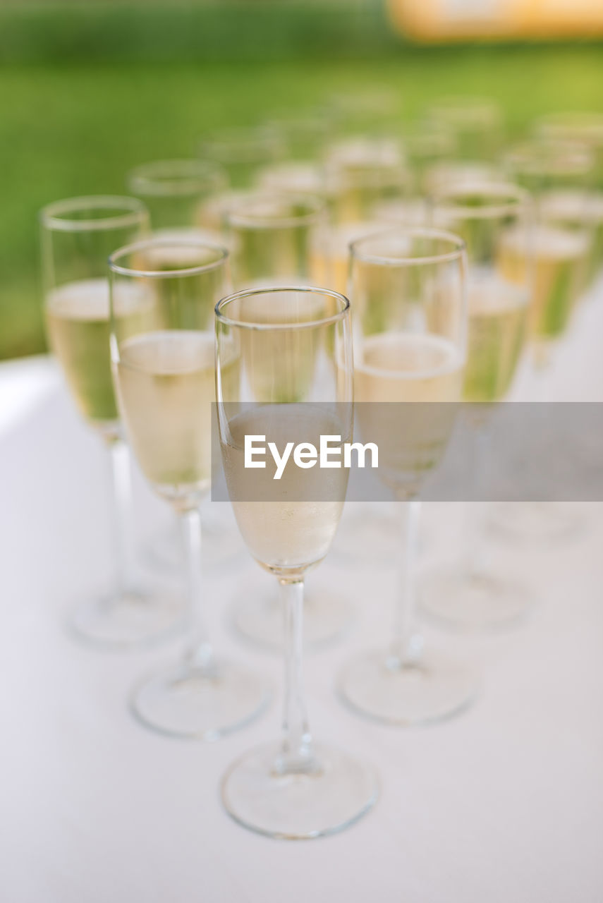 close-up of champagne flute on table