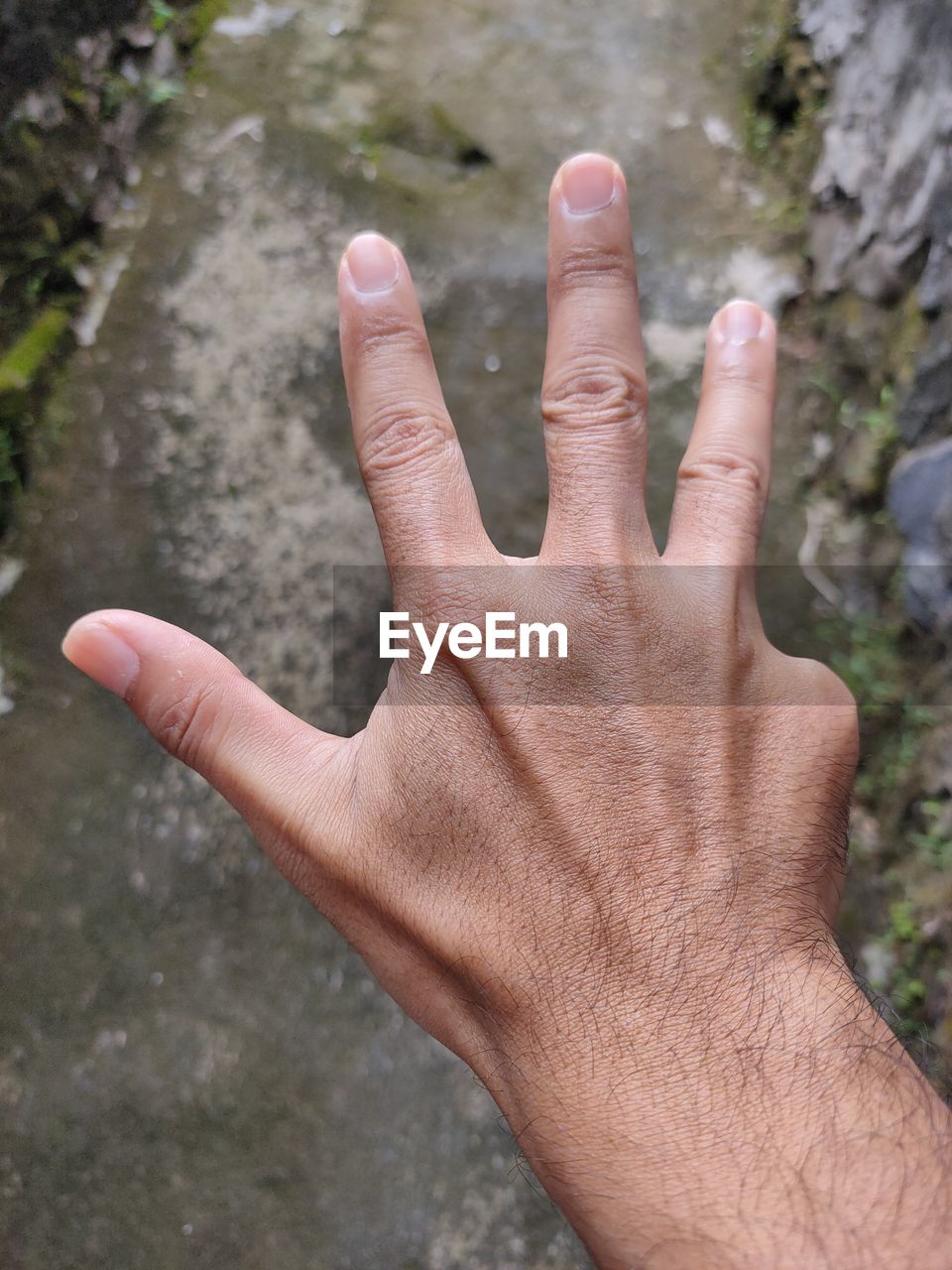 CLOSE-UP OF HAND