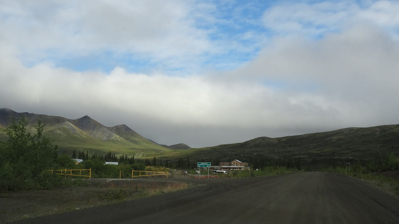 Road amidst landscape against sky