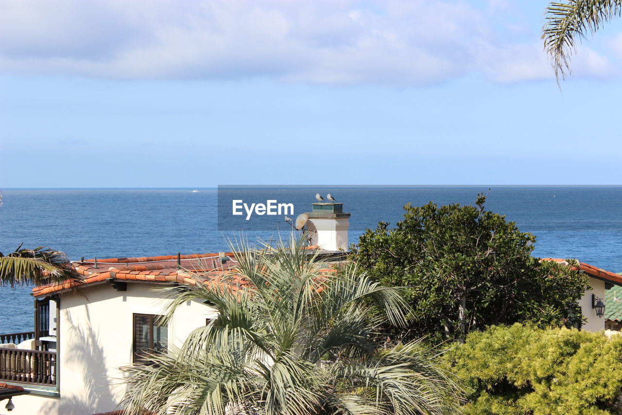 Laguna beach ca usa view over rooftops looking north at pacific ocean sunny day  southern california