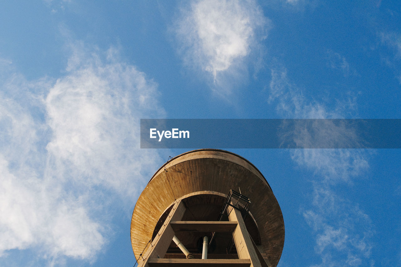 Low angle view of water tower against sky