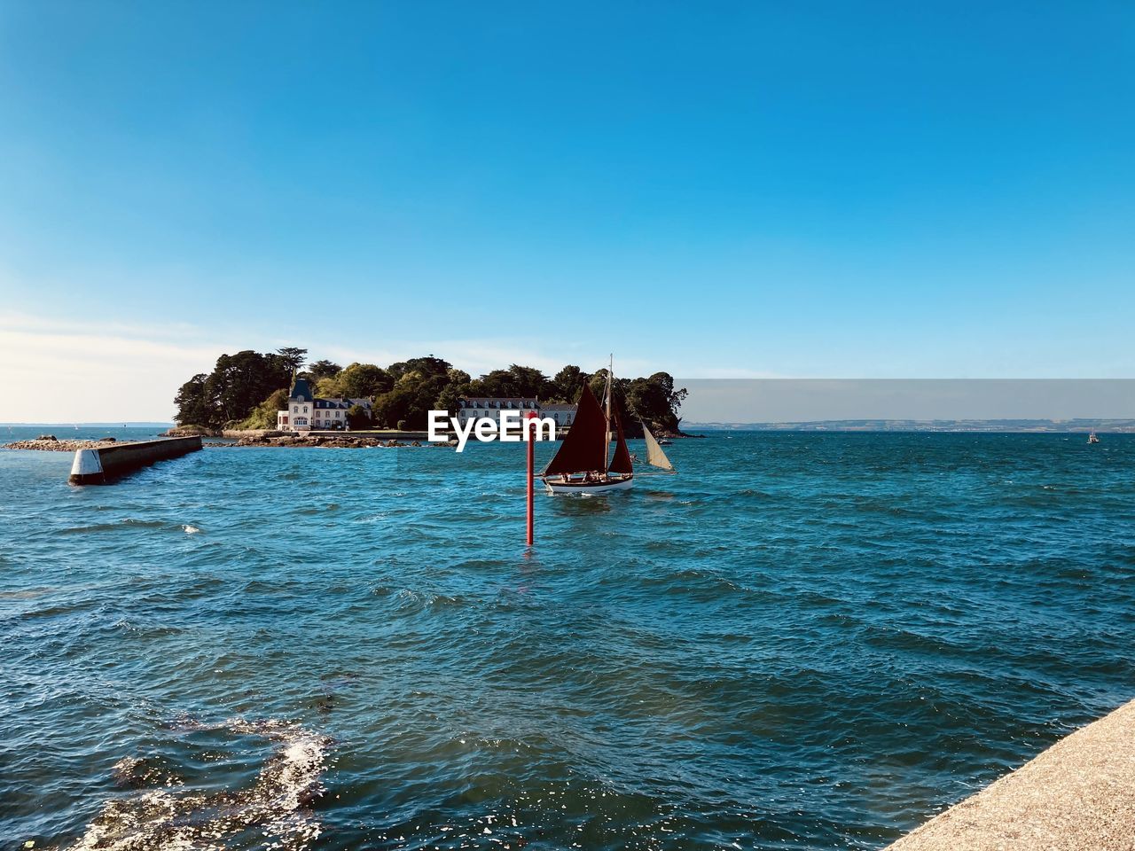 Scenic view of sea against clear sky