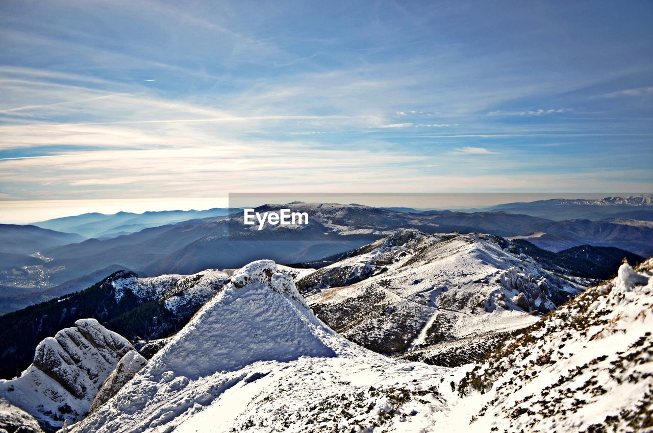 Aerial view of mountain range in winter