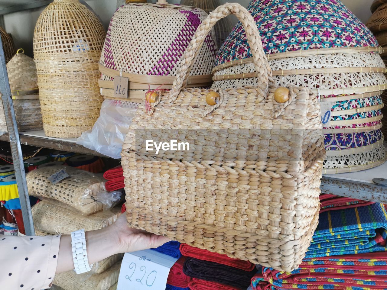 CLOSE-UP OF WICKER BASKET FOR SALE AT MARKET STALL