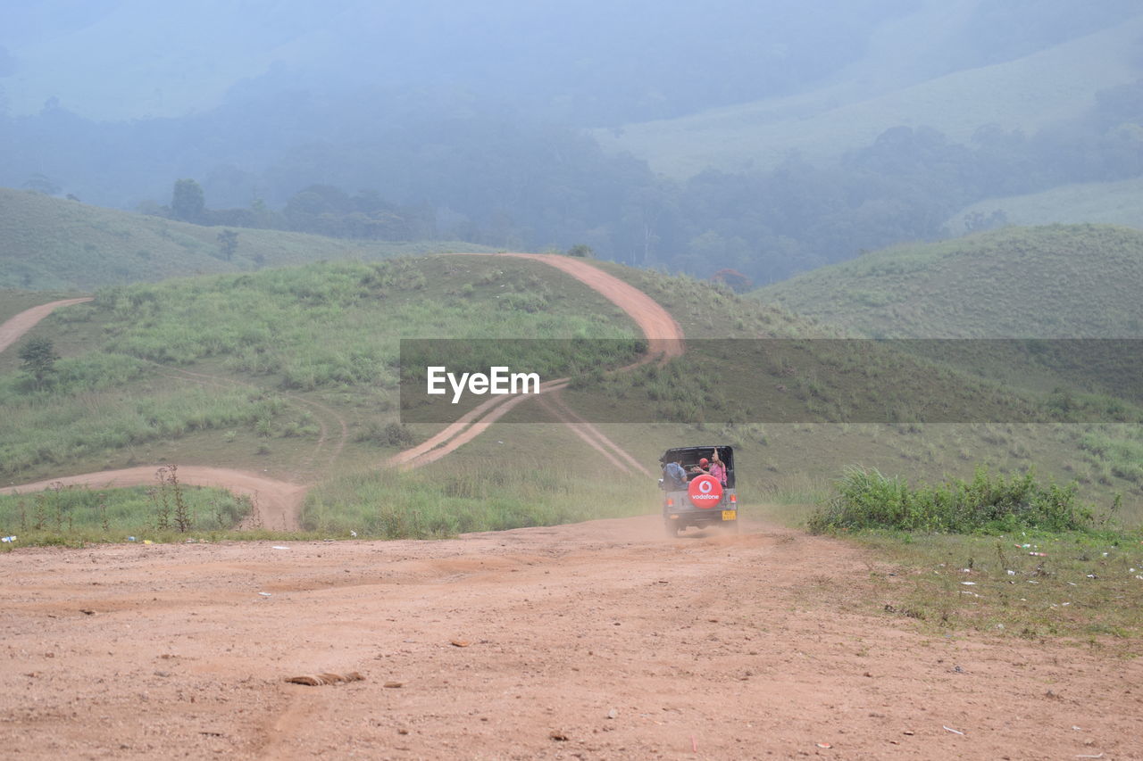 SCENIC VIEW OF MOUNTAIN AGAINST SKY