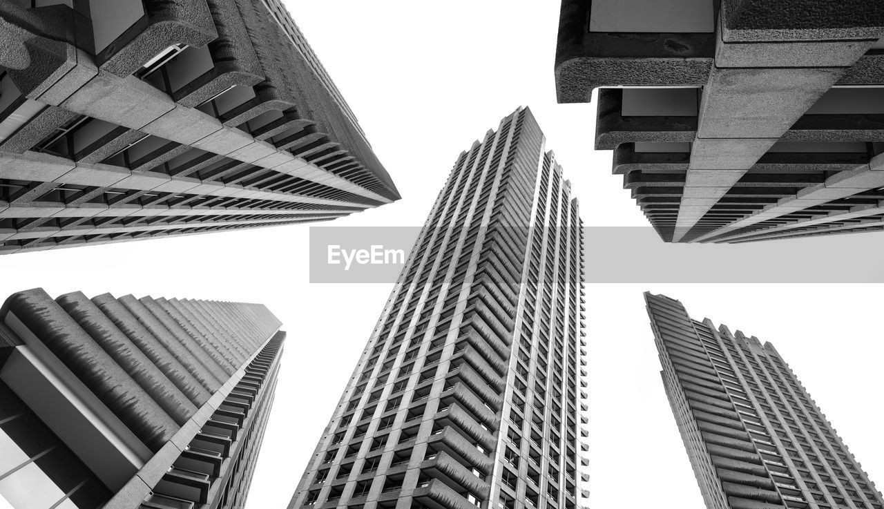 Low angle view of modern buildings against clear sky