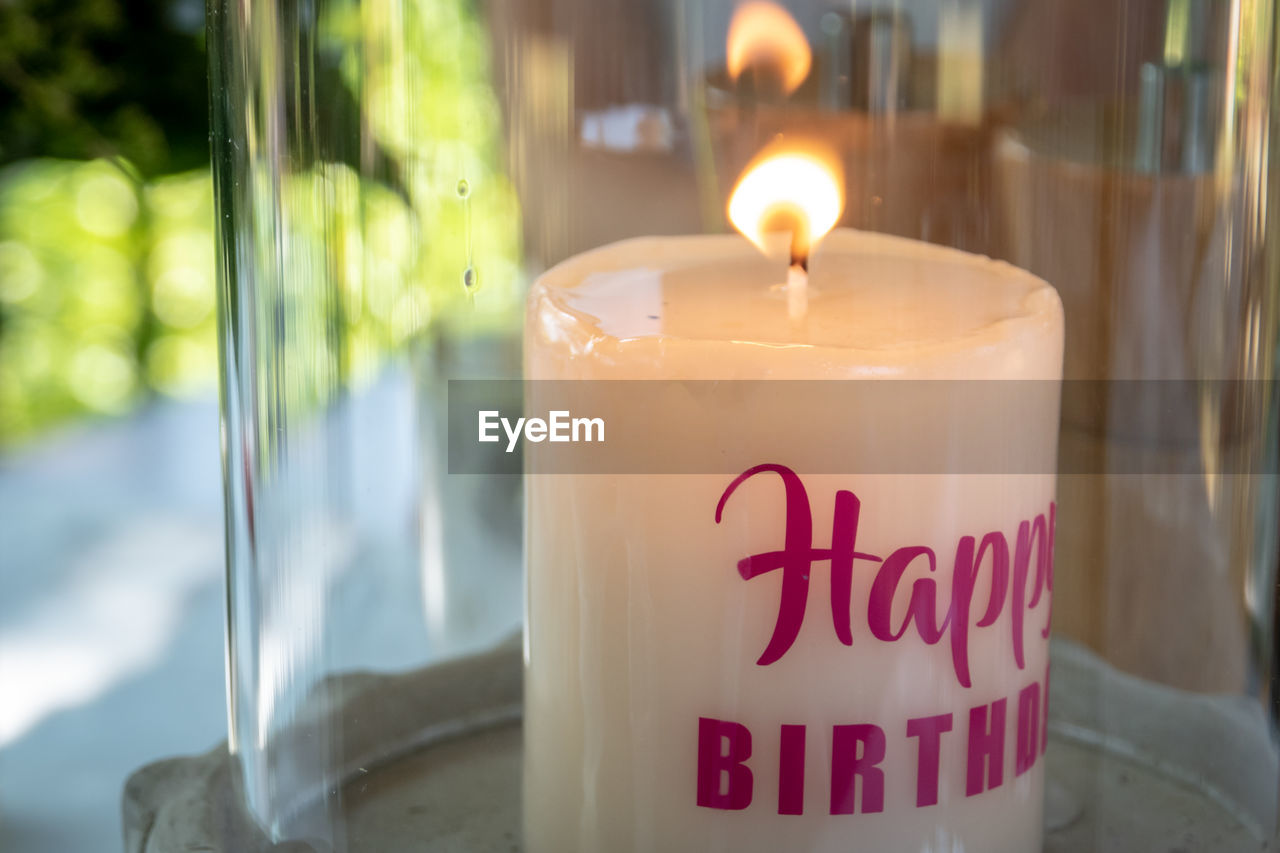 Close-up of illuminated candle