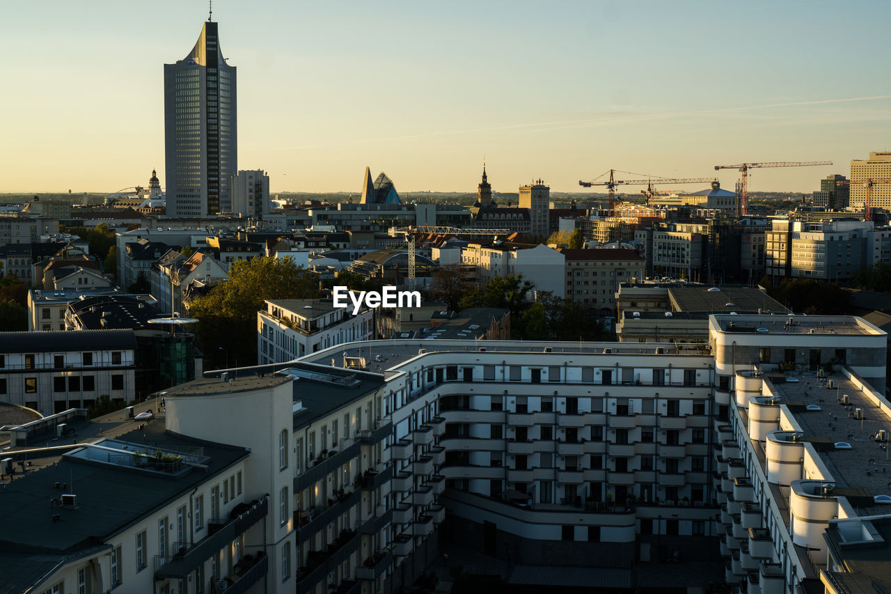 View of cityscape against sky during sunset